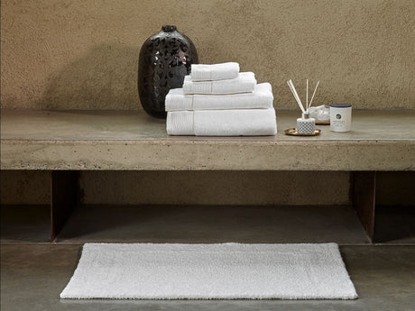 Viana Egyptian cotton bath mat with decorative border design