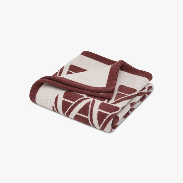 Ama merino wool throw blanket with modern geometric pattern