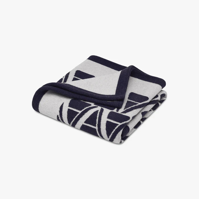 Ama merino wool throw blanket with modern geometric pattern