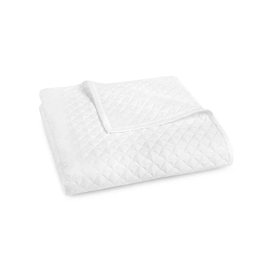 Suave quilted Egyptian cotton coverlet with elegant sateen finish