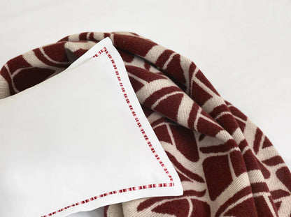 Ama merino wool throw blanket with modern geometric pattern