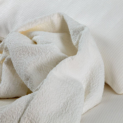Tamara cotton matelassé bedspread with textured woven pattern